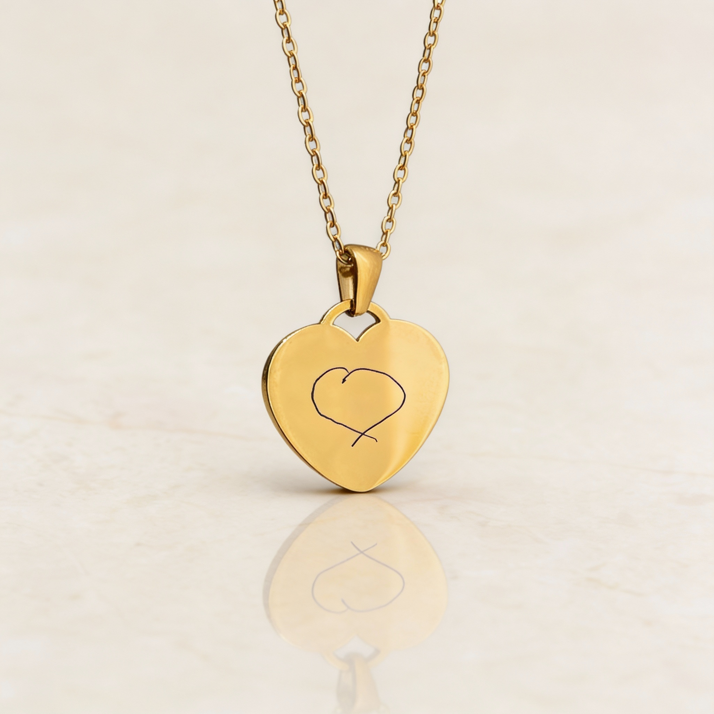 Ogrlica s gravurom rukopisa/crteža na medaljonu srca